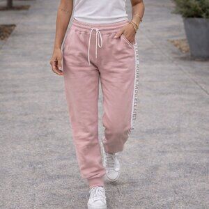 Royal Caribbean, size Large, pink cotton sweatpants, “travel more see more”